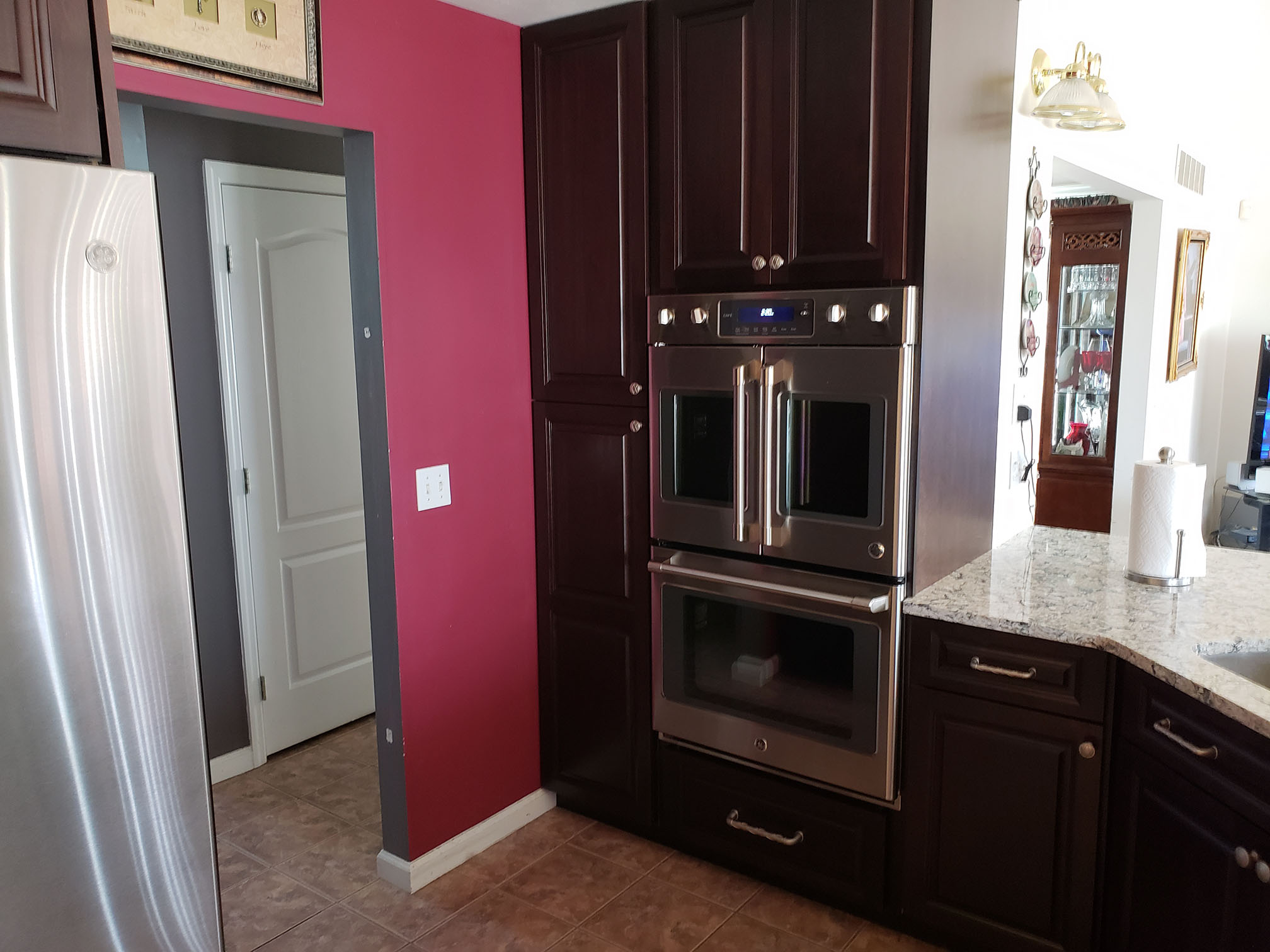 Rich dark wood kitchen cabinetry - Professional Wood Interiors St. Louis